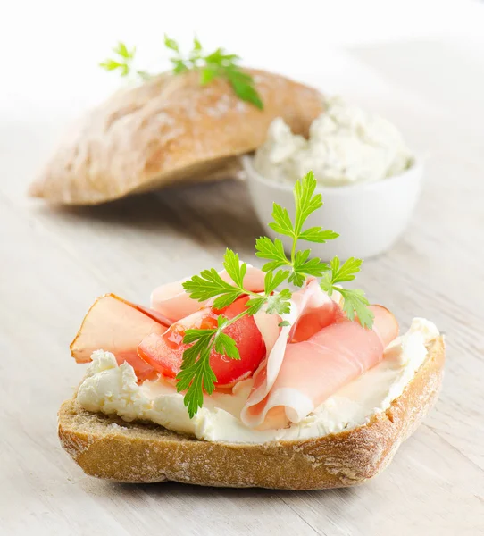 Baguette with bacon and cream cheese — Stock Photo, Image