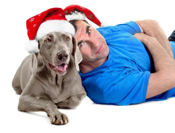 Happy Santa man with his dog — Stock Photo, Image