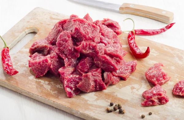 Carne crua com especiarias — Fotografia de Stock