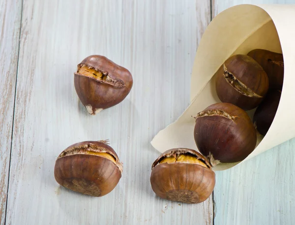 Chestnuts on table — Stock Photo, Image