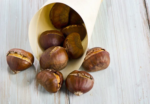 Chestnuts on table Stock Picture