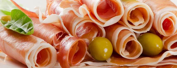 Slices of cured ham — Stock Photo, Image