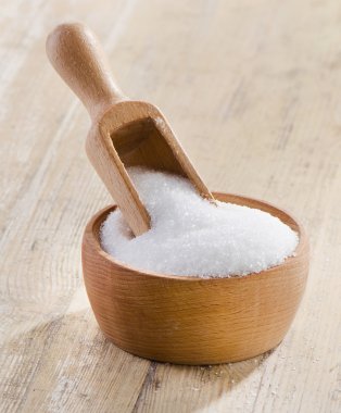 Sugar on wooden table