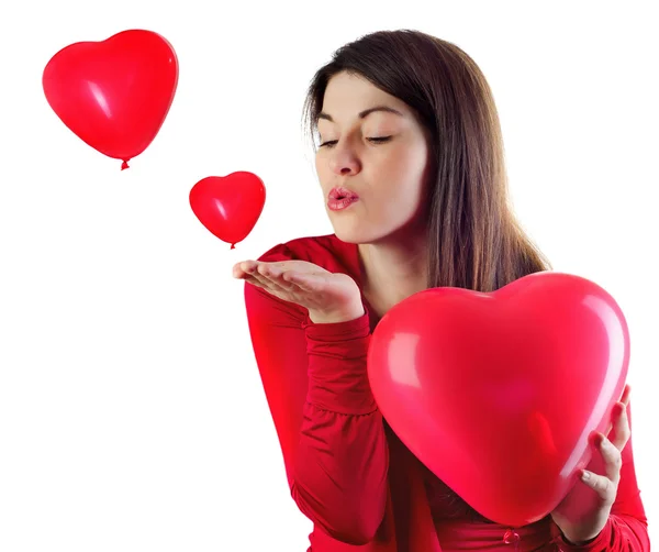 Mujer con globos en forma de corazón — Foto de Stock