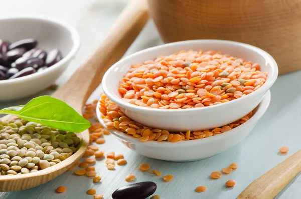 Beans and lentil on a wooden table