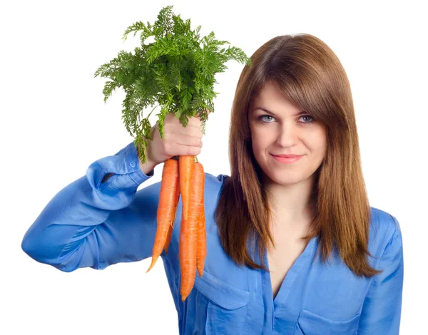 Woman holds bunch of carrots Stock Image