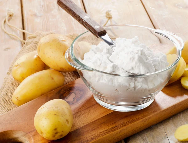 New potatoes and starch — Stock Photo, Image