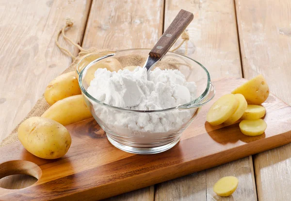 New potatoes and starch — Stock Photo, Image