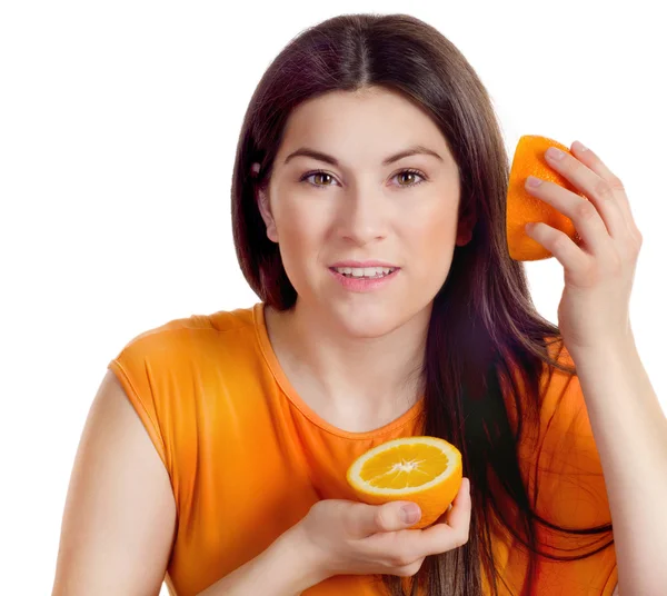 Женщина с апельсином — стоковое фото