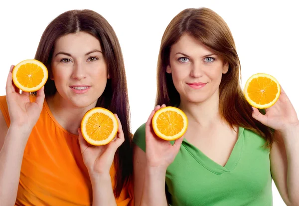 Kvinnor med orange — Stockfoto