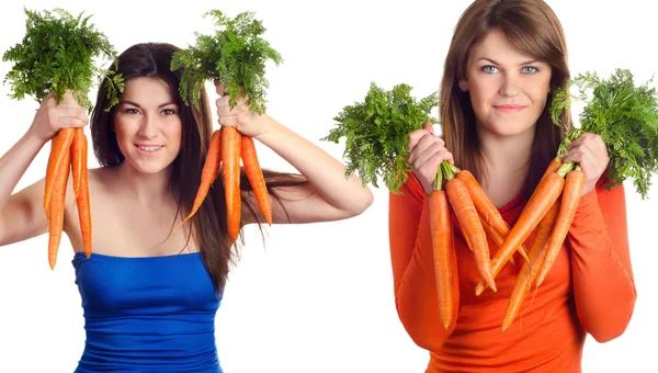 Women holds bunch of carrots — Stock Photo, Image