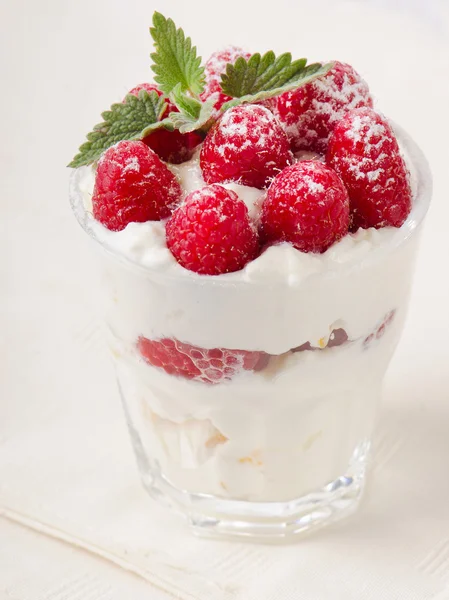 Dessert with raspberries and mint leaf — Stock Photo, Image