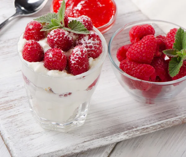 Dessert with raspberries and mint leaf — Stock Photo, Image