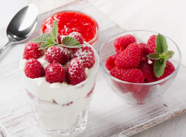Dessert with raspberries and mint leaf — Stock Photo, Image