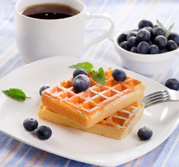 Belgian waffles with tea cup — Stock Photo, Image