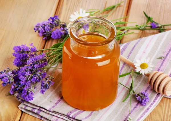 Glasburk med honung — Stockfoto