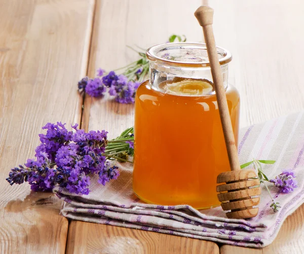 Скляна баня з меду — стокове фото
