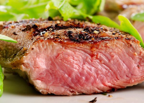 Beef steak with fresh salad. Selective focus