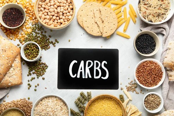 Mejores Fuentes Carbohidratos Sobre Fondo Gris Claro Concepto Comida Saludable — Foto de Stock