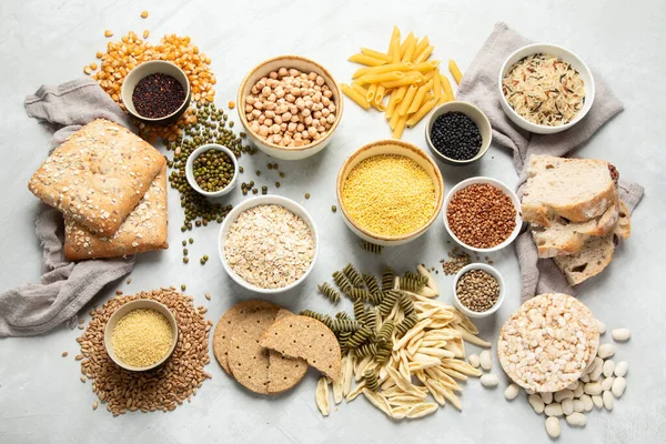 Mejores Fuentes Carbohidratos Sobre Fondo Gris Claro Concepto Comida Saludable — Foto de Stock