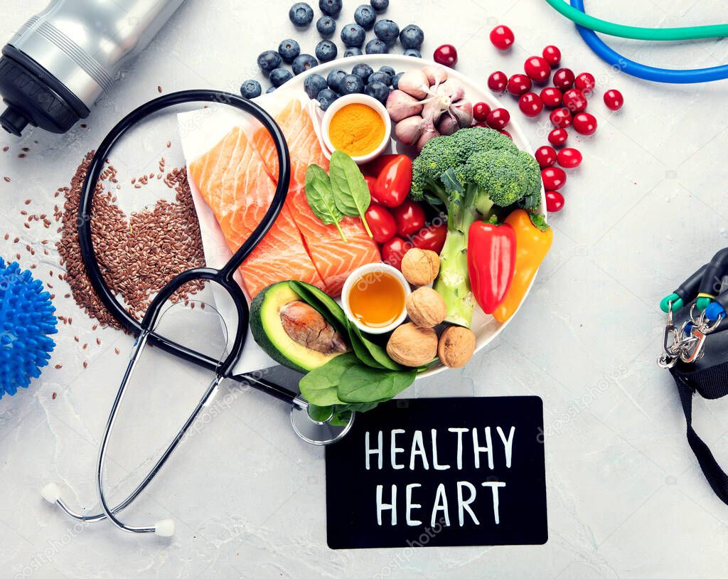 Foods for healthy heart on light background. Food for healthy heart, brain and good memory. High in antioxidants, minerals and vitamins. Top view, flat lay