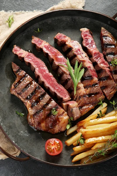 Beef Steak Meat Tomato French Potatoes Dark Plate Grey Background — Stock Fotó