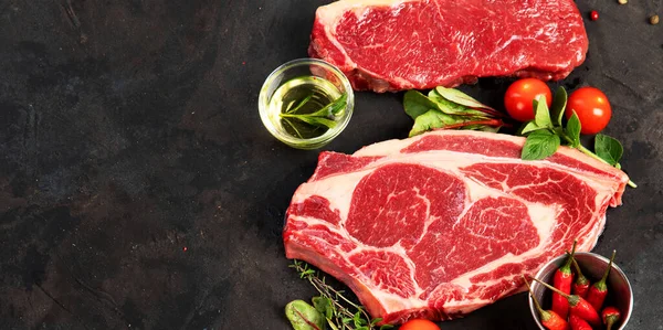 Variety Raw Beef Meat Steaks Grilling Seasoning Utensils Dark Background — Stok fotoğraf