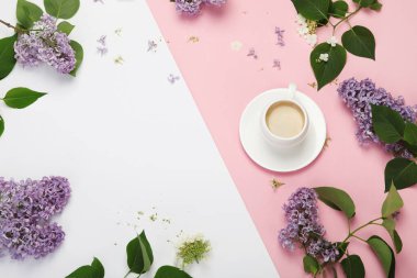 Composition with cup of coffee on color background. Spring natural background. Top view, flat lay, copy space