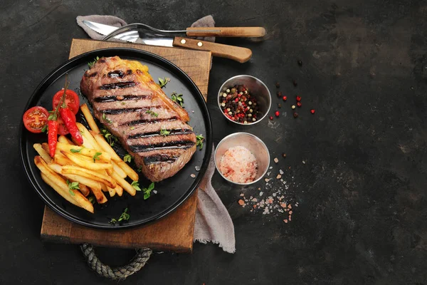 Striploin Beef Steak French Fries Dark Background Freshly Grilled Healthy — Stock Fotó