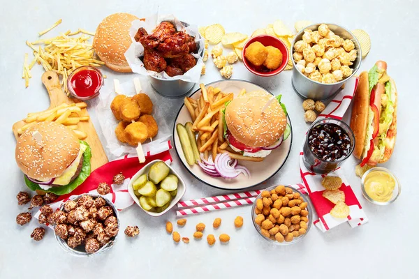 Various American Food French Fries Hamburgers Nuggets Hotdog Chips Popcorn — Fotografia de Stock