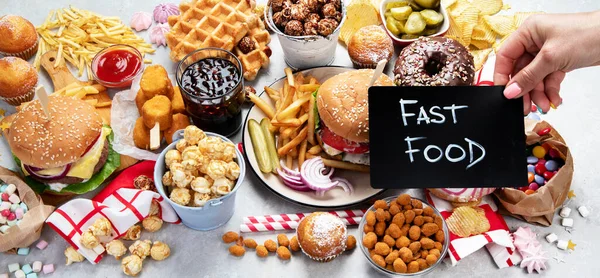 Various American Food French Fries Hamburgers Nuggets Hotdog Chips Popcorn — Foto de Stock