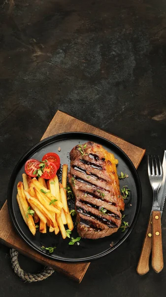 Striploin Beef Steak French Fries Dark Background Freshly Grilled Healthy — Stock Fotó