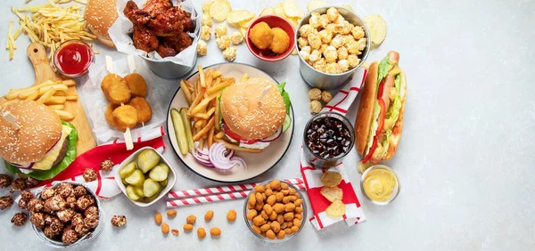 Various American Food French Fries Hamburgers Nuggets Hotdog Chips Popcorn — Fotografia de Stock