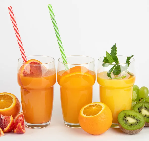 Fruit Juices Assortment Light Background Freshly Made Drinks — стоковое фото
