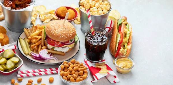 Various American Food French Fries Hamburgers Nuggets Hotdog Chips Popcorn — 图库照片