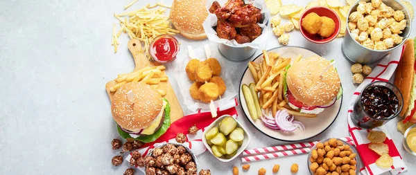 Various American Food French Fries Hamburgers Nuggets Hotdog Chips Popcorn — 스톡 사진