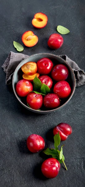 Red Plums Isolated Dark Background Top View — Stockfoto