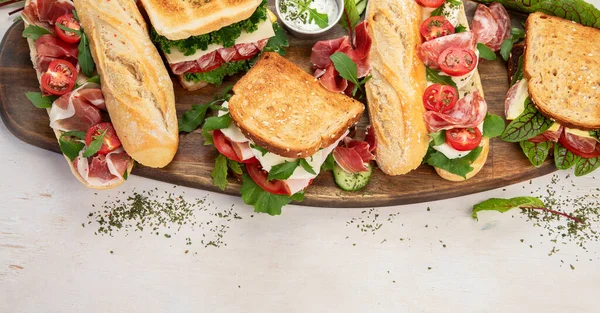 Assorted Delicious Baguette Sandwiches Various Kinds Club Sandwiches White Background — Fotografia de Stock