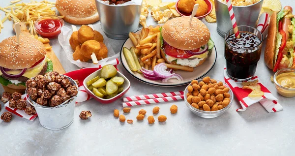 Various American Food French Fries Hamburgers Nuggets Hotdog Chips Popcorn — Stockfoto