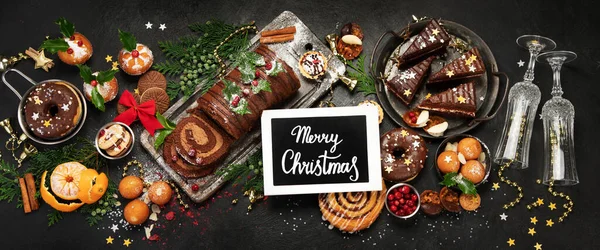 Παραδοσιακό Χριστουγεννιάτικο Επιδόρπιο Σκούρο Φόντο Φαγητό Διακοπών Πάνω Άποψη Πανόραμα — Φωτογραφία Αρχείου