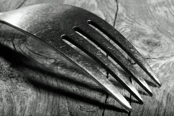Tenedor antiguo en la mesa — Foto de Stock