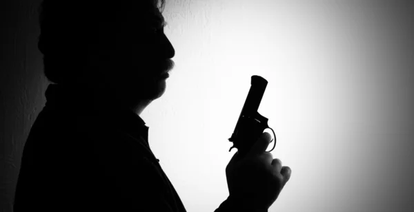 Man with gun — Stock Photo, Image