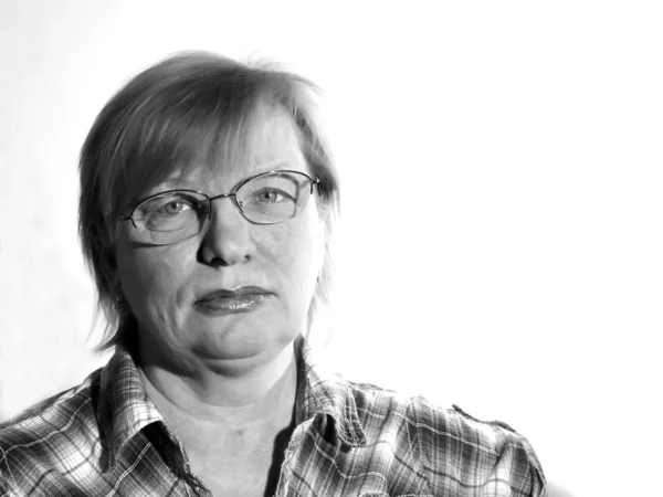 Middle-aged woman with eyeglasses — Stok fotoğraf