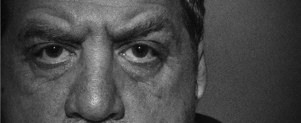 Eyes of middle-aged man, very grain black and white photo — Stock Photo, Image