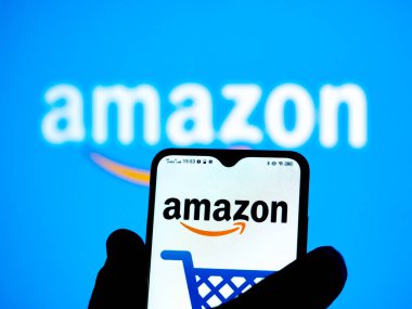 Kiev, Ukraine - January 7, 2022: In this photo illustration Amazon logo seen displayed on a smartphone