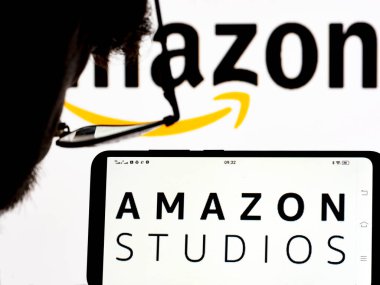  Kiev, Ukraine - January 9, 2022: In this photo illustration Amazon Studios logo seen displayed on a smartphone