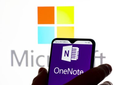 Kiev, Ukraine - January 9, 2022:  In this photo illustration Microsoft OneNote logo seen displayed on a smartphone