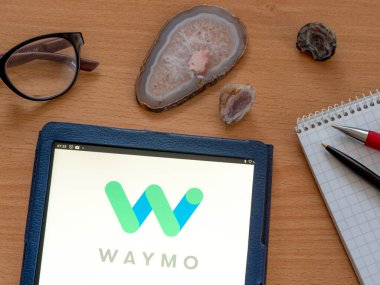 Garham, Bavaria, Germany - May 10, 2022: In this photo illustration Waymo LLC owned by Alphabet Inc. logo seen displayed on a tablet