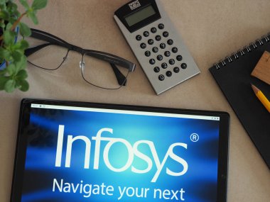 Garham, Bavaria, Germany - July 13, 2022: In this photo illustration, Infosys (Infosys Technologies Limited) logo seen displayed on a tablet.