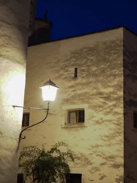 Architectural detail in the courtyard of the Hohensalzburg fortress at night. It is the largest fully preserved castle in Central Europe. Salzburg, Austria